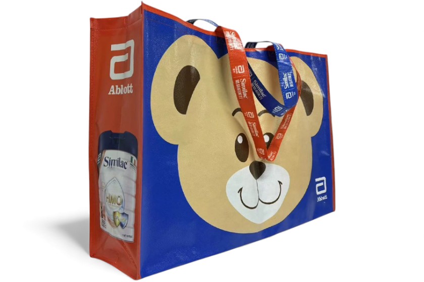 vrolijke grote boodschappentassen